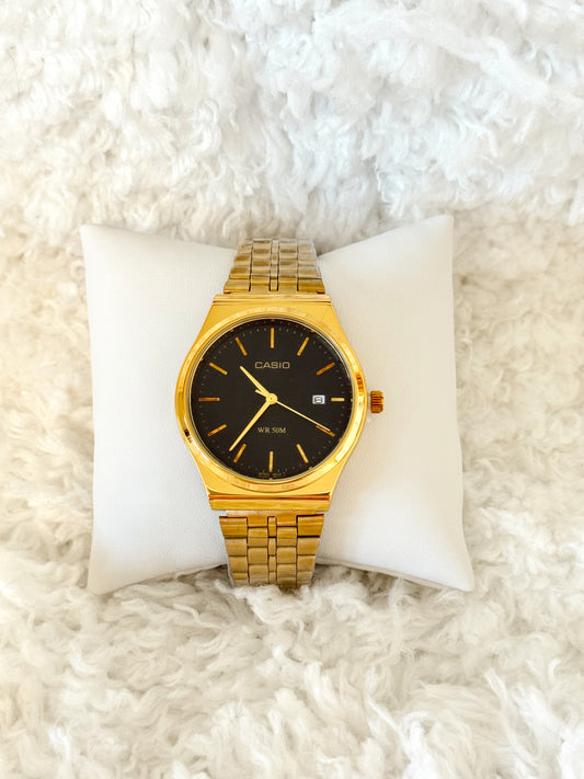 Reloj- Casio- oro, negro